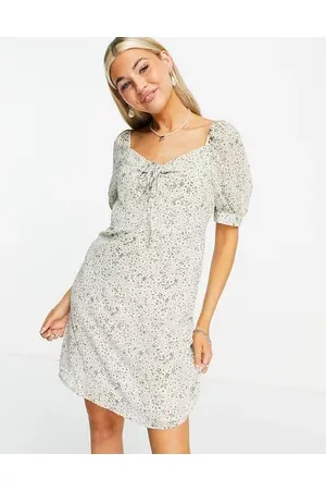 ONLY Mini dress with ruched bust and puff sleeve in green floral