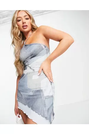 Motel 90s tie halter neck asymmetric mini dress in slinky printed denim