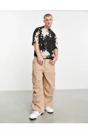 ASOS DESIGN Oversized t-shirt in bleach tie dye with chest print