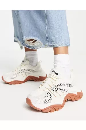 Fila Interation trainers in cream and leopard print with gum sole
