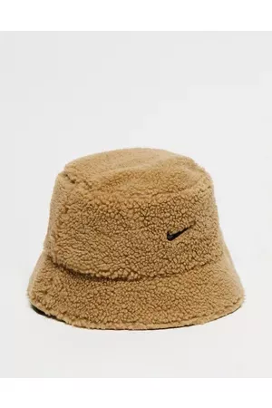 Nike Unisex reversible sherpa bucket hat in beige and