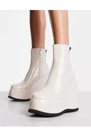 Shellys Roxanne wedge boots in cream patent