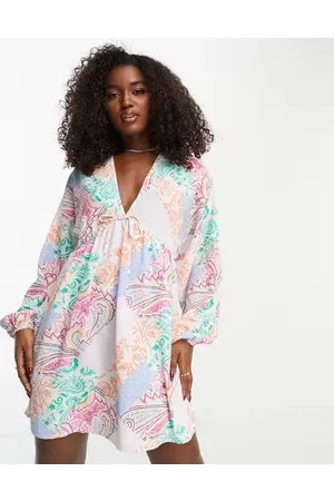 ASOS Chuck on swing mini dress in splice floral print