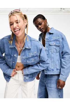 Calvin Klein Jeans monogram print denim trucker jacket in mid wash