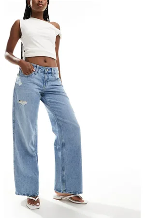 Hollister Low rise baggy jeans in mid with destroy details