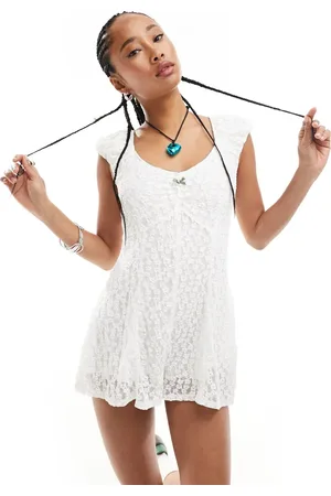 Daisy Street Bubble lace flippy playsuit with rosette bust detail