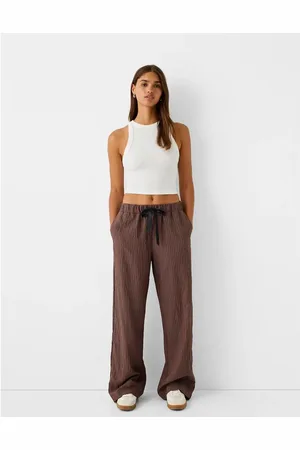 Bershka Ribbon drawstring waist wide leg trousers in brown & stripe