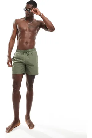 The Couture Club Splash reactive emblem swim shorts in khaki