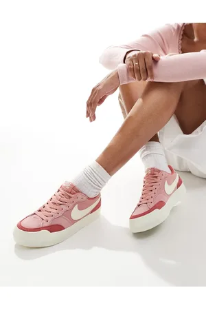 Nike Zoom Pogo Plus trainers in and white