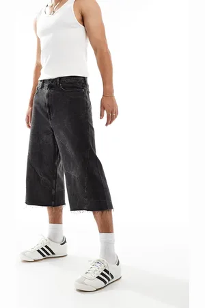 Weekday Twist low waist cropped jeans with raw hem in acid wash