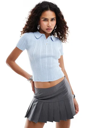 Motel Lynetta knitted fitted polo shirt in baby