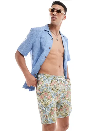 Hollister 7inch mosaic print swim shorts in