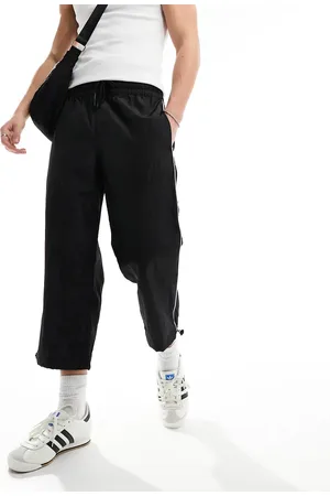 ASOS Wide awkward length nylon trouser with toggle detail in