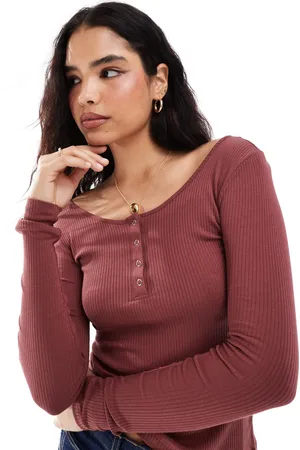 Pieces® Ribbed popper front long sleeve top in spice