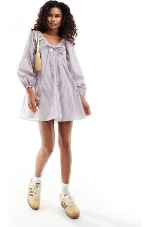 Glamorous Bow tie smock mini dress in brown purple stripe