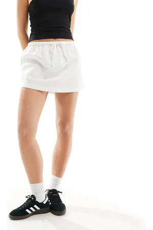 COLLUSION Beach low rise linen mini skirt in ecru