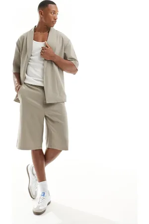 Bershka Boxy tailored co-ord short in beige