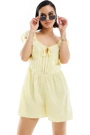 ASOS Dobby playsuit with corset waist in lemon
