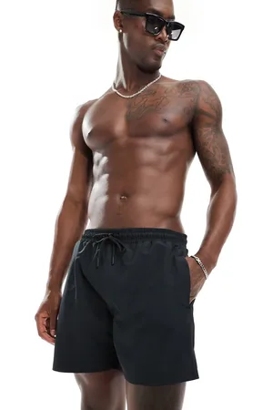 The Couture Club Splash reactive emblem swim shorts in