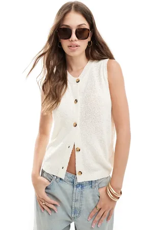 ASOS Knitted crew neck waistcoat in textured yarn in cream
