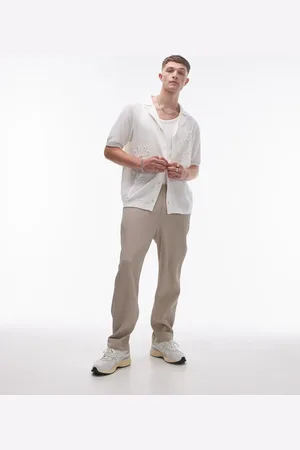 Topman Co-ord tapered plisse trousers in stone