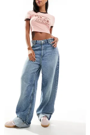 Bershka Deep turn up balloon jeans in mid wash