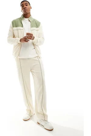 ASOS Wide ribbed velour joggers in off with green detail - CREAM