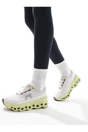 On Running ON Cloudmonster running trainers in white and