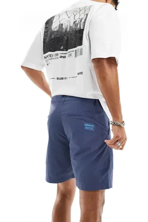 adidas Woven chino shorts in navy