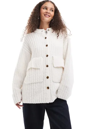Monki Chunky knit rib high neck cardigan with button front and front flap pockets in off