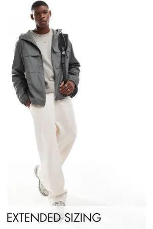 ASOS Rubberised rain jacket with chest pockets in charcoal