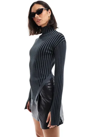 & OTHER STORIES Knitted rib fitted sweater with cut away hem detail in black two tone