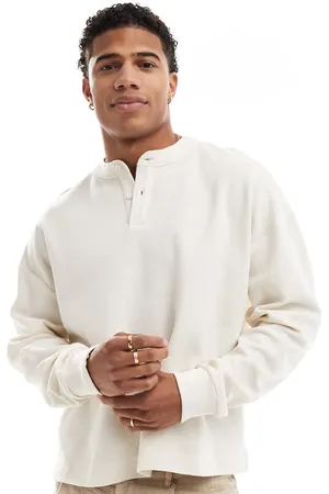 ASOS Oversized boxy waffle long sleeve t-shirt with henley neck in cream