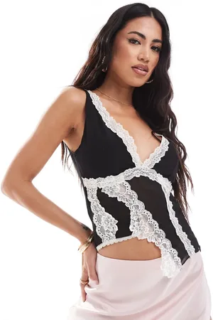 Edikted Asymmetric vest top with white lace in