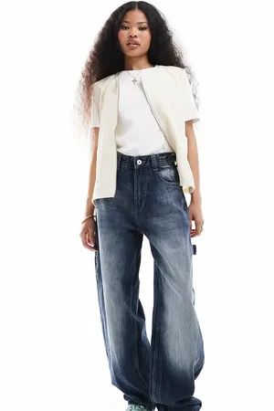 Bershka Petite adjustable waist carpenter jeans in acid wash blue