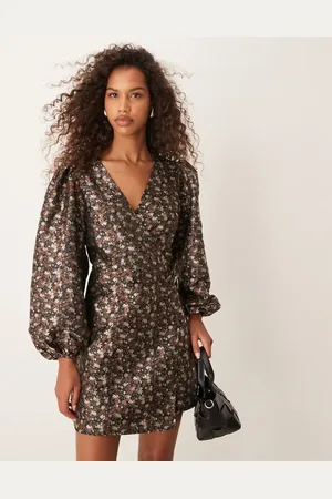 Glamorous V neck balloon sleeve mini dress with front wrap in 70
