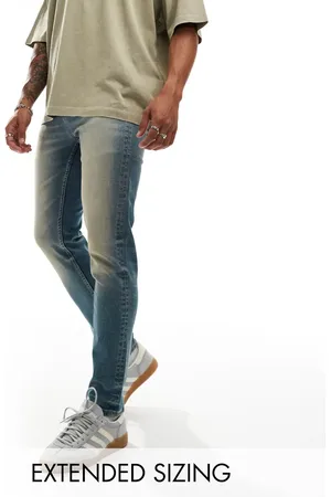ASOS Skinny jeans with extreme tint in mid wash
