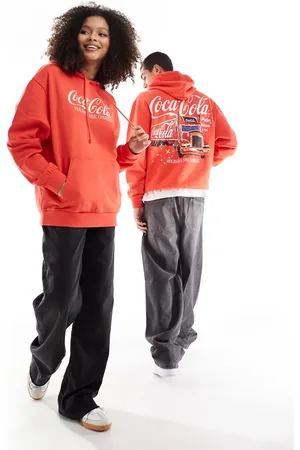 ASOS Christmas unisex oversized hoodie with Coca Cola festive prints in