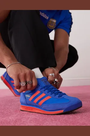 adidas SL 72 RS trainers in and orange