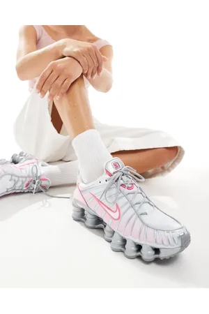 Nike Shox TL unisex trainers in metallic silver and