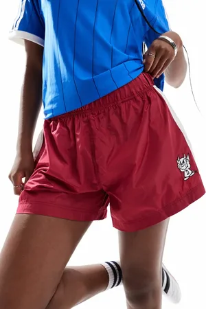Deus Ex Machina X ASOS exclusive contrast track short in red