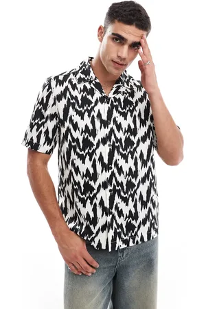 Fred Perry Short sleeve revere collared shirt in black and animal print