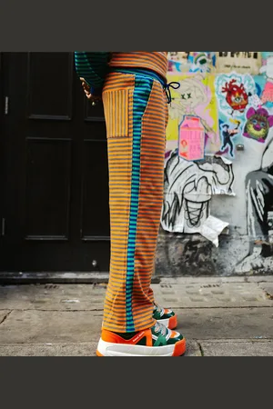 Labelrail X OliBrom straight leg joggers in orange and green constrast stripe co-ord