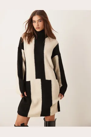 VILA Knitted high neck mini dress in abstract print
