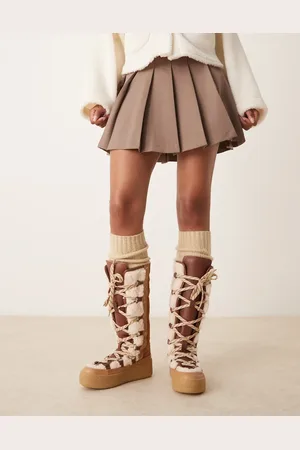 Free People Stitch detail shearling mukluk boots in vintage tan