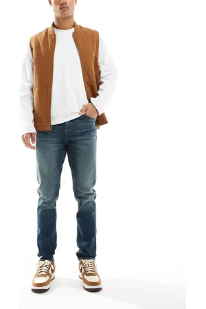ASOS Skinny jeans with green tint in mid wash