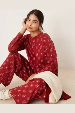 ASOS Top and trouser pyjama set in bow print