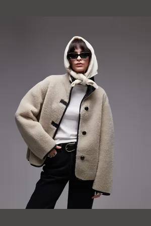 MANGO Funnel neck shearling jacket in beige