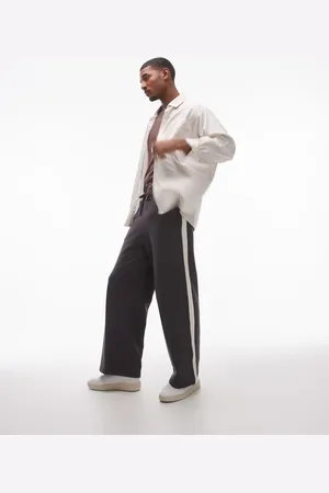 Topman Baggy leg jogger with contrast side stripe in charcoal