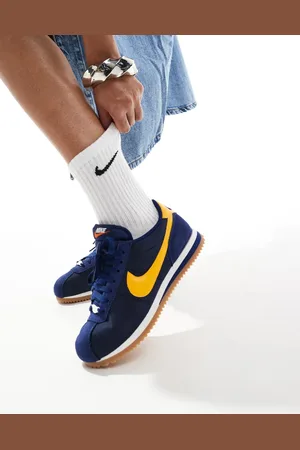 Nike Cortez TXT trainers in navy and yellow